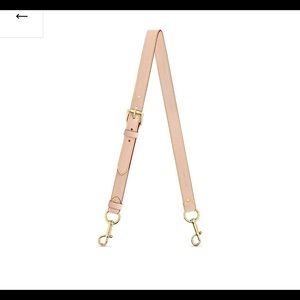 Louis Vuitton vachetta leather shoulder strap.